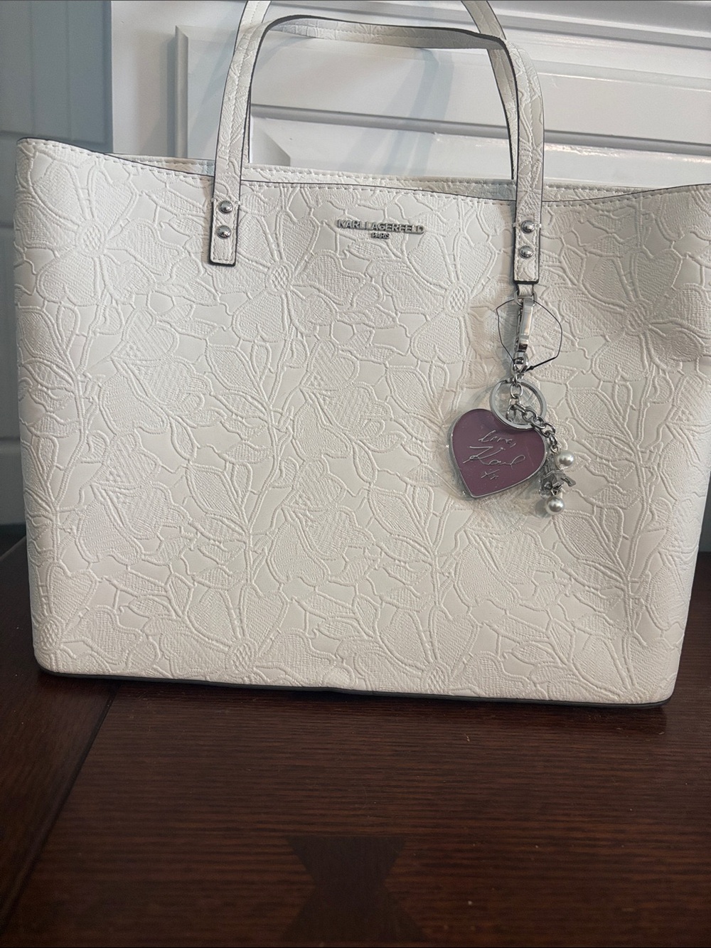 Karl Lagerfeld White Floral Embossed Tote with Heart Charm Accent